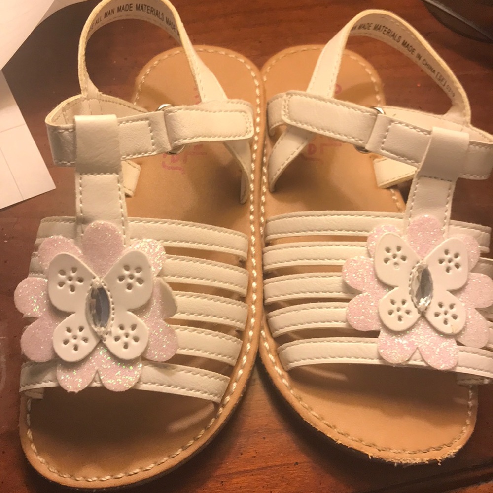 White sandal worn once